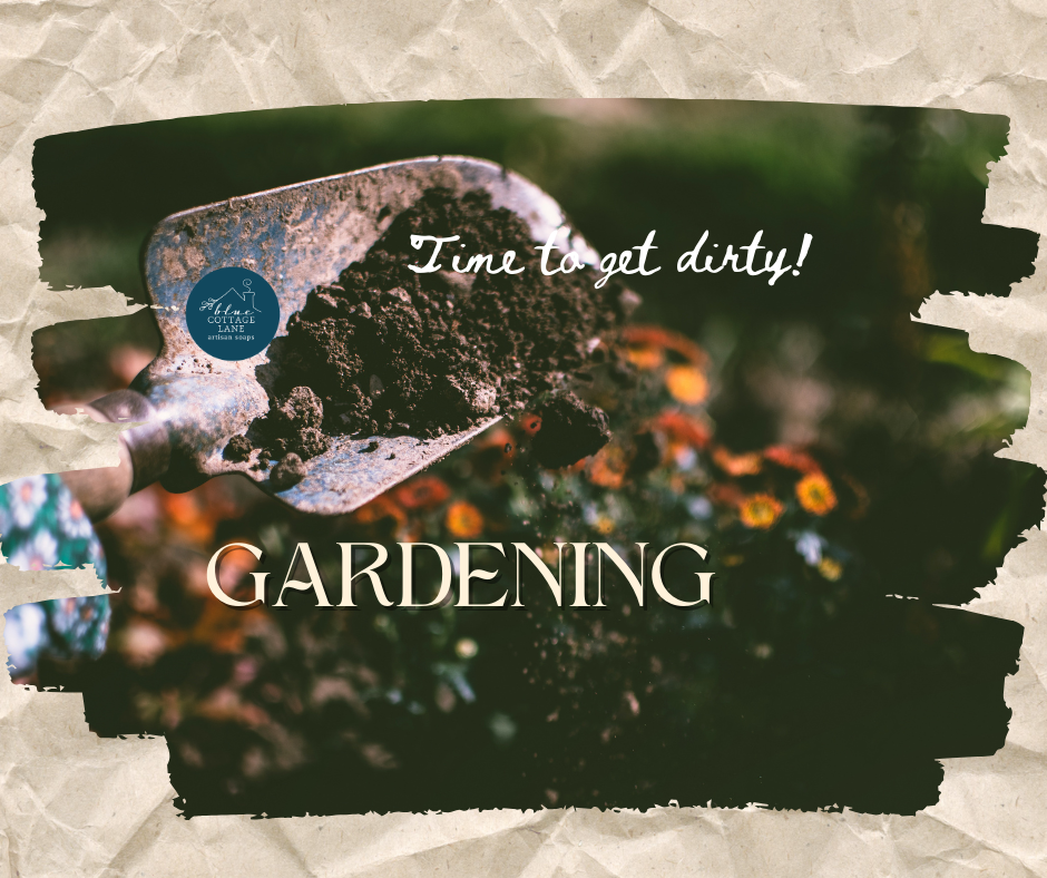 Shovel in rich soil with flowers and Blue Cottage Lane logo.